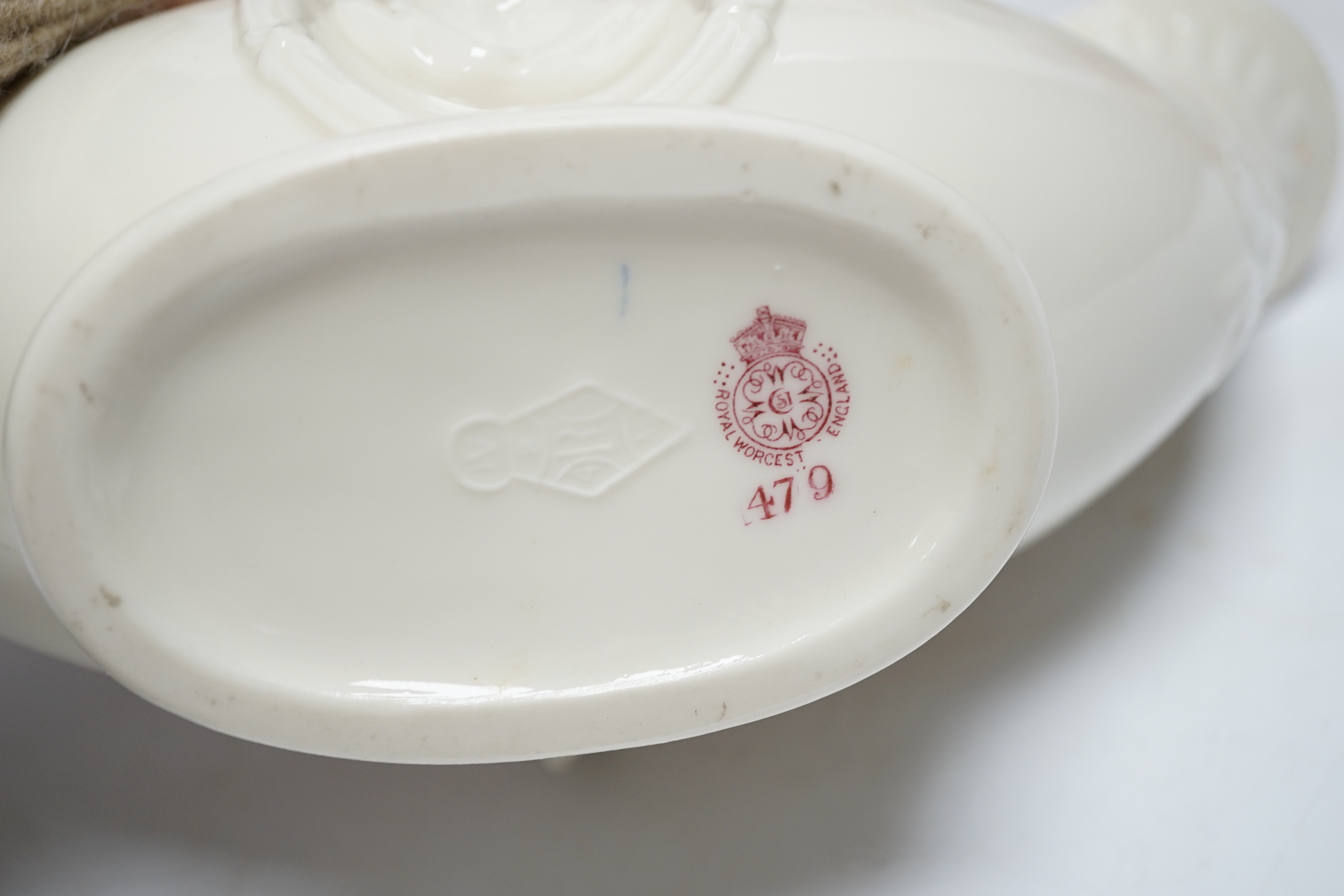 A Royal Worcester classical revival glazed Parian vase and two Staffordshire dogs, 30cm